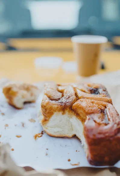 cinnamon bun and coffee
